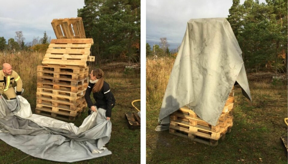 Her dekkes 'altertavlen' laget av europaller med brannbeskyttende tekstil. Her dekkes 'altertavlen' laget av europaller med brannbeskyttende tekstil.